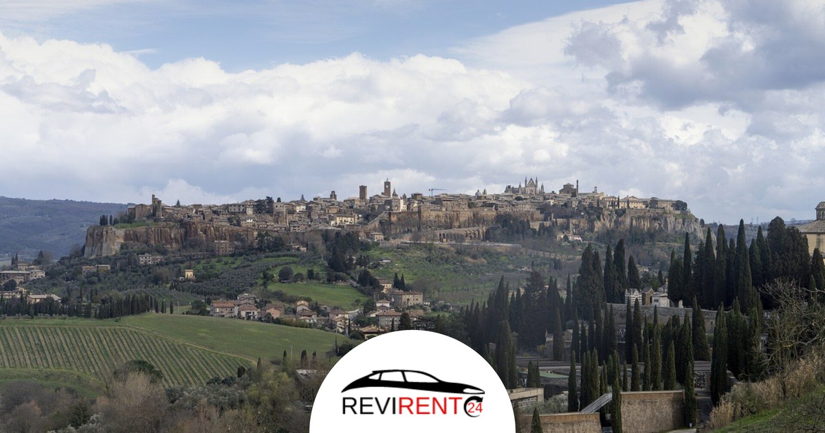 Noleggio auto per visitare Orvieto con Revirent24 - panorama della citta sulla rupe di tufo con il Duomo